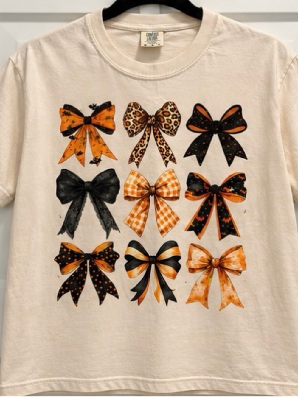 Comfort Colors Cream Tee with Orange and Black Bow Grid Graphic